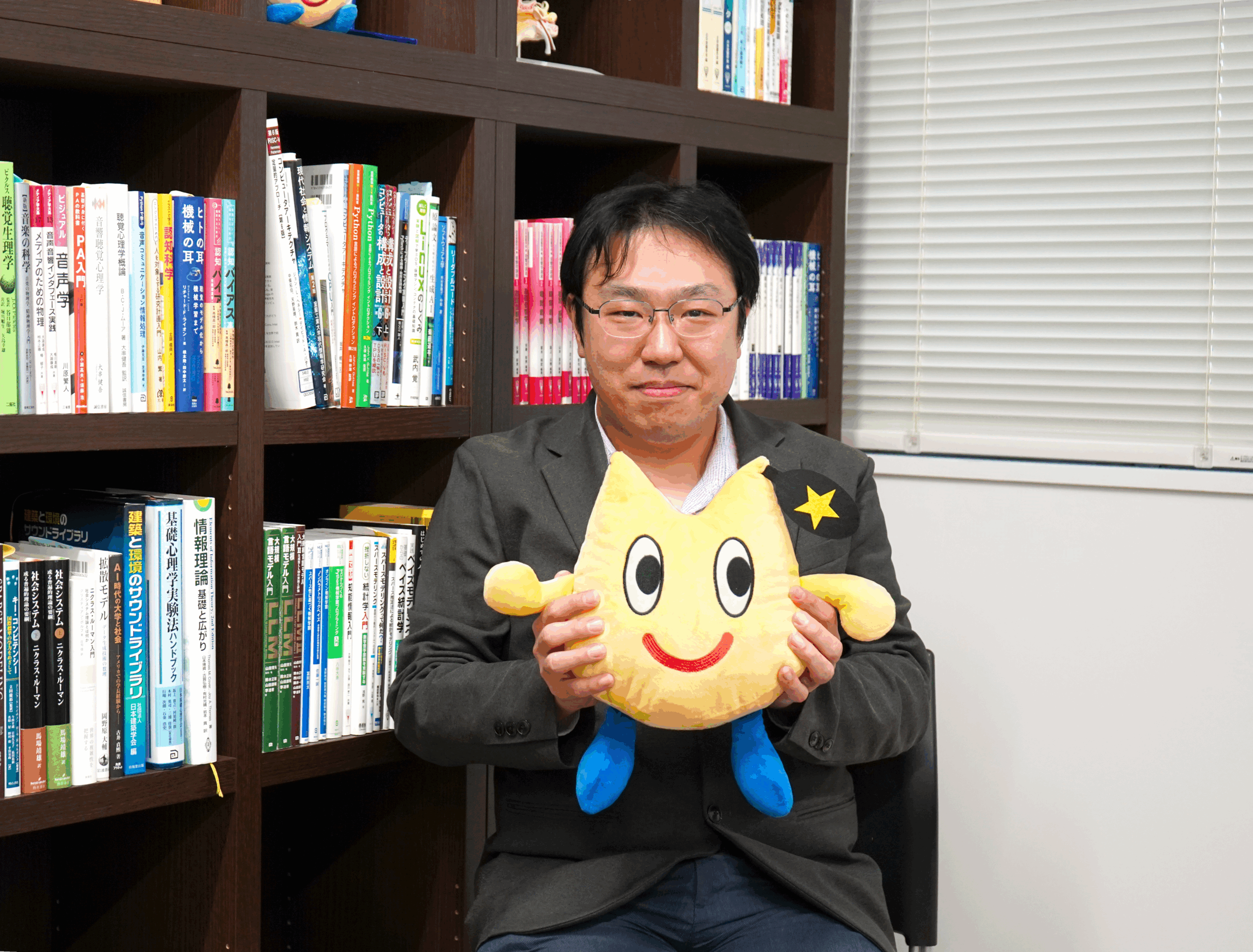 室蘭工業大学小林洋介准教授のバストアップの写真